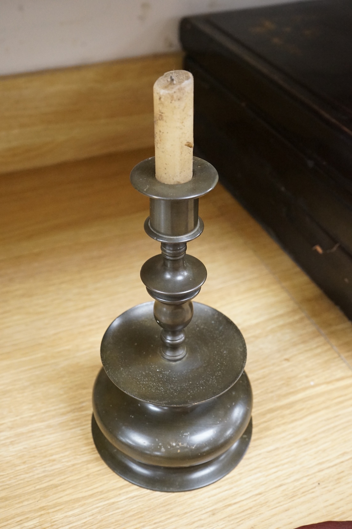 A Dutch bronze candlestick, 24cm high